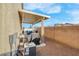 Cozy patio with cover, grill, and brick fence offering a great outdoor living area for relaxation and entertainment at 6461 Karlsen Ct, Las Vegas, NV 89122