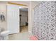 This bathroom features a closet, a toilet, and a shower-bathtub at 6461 Karlsen Ct, Las Vegas, NV 89122