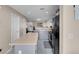 A well-designed kitchen and breakfast bar lead to additional rooms, offering flexibility in this space at 6461 Karlsen Ct, Las Vegas, NV 89122