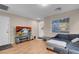 Comfortable living room features hardwood floors and large window, offering ample natural light at 6461 Karlsen Ct, Las Vegas, NV 89122