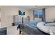 The main bedroom features a window, carpet, and furniture at 6461 Karlsen Ct, Las Vegas, NV 89122
