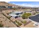 Spacious home with a two-car garage in a hillside community with mountain views at 6491 Wild Blue Ct, Las Vegas, NV 89135
