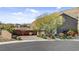 Modern two-story home with desert landscaping, brick driveway, and mountain views at 6491 Wild Blue Ct, Las Vegas, NV 89135
