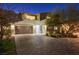 Charming home with a two-car garage and a beautifully paved driveway at 6491 Wild Blue Ct, Las Vegas, NV 89135