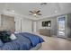 The bedroom has a sliding glass door that leads to an outdoor seating area and a large dresser at 6491 Wild Blue Ct, Las Vegas, NV 89135