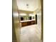 Large bathroom featuring dual sinks and tile flooring at 6628 Martinsville Pl, Las Vegas, NV 89110