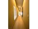 Hallway view featuring neutral tones and a well-lit, inviting space at 6628 Martinsville Pl, Las Vegas, NV 89110