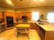 Spacious kitchen featuring an island, modern appliances, and ample countertop space at 6628 Martinsville Pl, Las Vegas, NV 89110