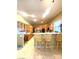 Eat-in kitchen featuring lots of counter space and breakfast bar seating at 6628 Martinsville Pl, Las Vegas, NV 89110