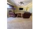 Spacious living room with a fireplace and two reclining chairs at 6628 Martinsville Pl, Las Vegas, NV 89110