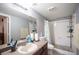 Bright bathroom featuring a shower-over-tub and a vanity with lots of counter space at 6650 W Warm Springs Rd # 1079, Las Vegas, NV 89118