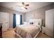 Bright bedroom is well-lit with a ceiling fan, closet, and plenty of space to make it your own private getaway at 6650 W Warm Springs Rd # 1079, Las Vegas, NV 89118