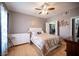 Bright bedroom features a ceiling fan, closet space, and a comfortable layout for relaxation and rest at 6650 W Warm Springs Rd # 1079, Las Vegas, NV 89118