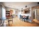 Open concept dining area featuring hardwood floors and access to living room at 6650 W Warm Springs Rd # 1079, Las Vegas, NV 89118
