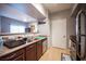 Kitchen is well-equipped with stainless steel appliances, ample counter space, and a convenient open layout at 6650 W Warm Springs Rd # 1079, Las Vegas, NV 89118