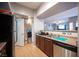 Kitchen area with stainless steel appliances, ample counter space, and convenient access to the living and dining areas at 6650 W Warm Springs Rd # 1079, Las Vegas, NV 89118
