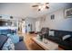 Open living and dining area with hardwood floors and a comfortable seating arrangement at 6650 W Warm Springs Rd # 1079, Las Vegas, NV 89118