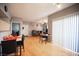 Open living and dining area featuring hardwood floors, recessed lights, and ample natural light at 6650 W Warm Springs Rd # 1079, Las Vegas, NV 89118
