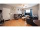 Inviting living room featuring hardwood floors, a comfortable seating area, and natural light at 6650 W Warm Springs Rd # 1079, Las Vegas, NV 89118