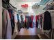 Walk-in closet with clothing rack and built-in shelving for ample storage space at 6650 W Warm Springs Rd # 1079, Las Vegas, NV 89118