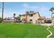 Large, grassy backyard offers ample space for recreation, gardening, and outdoor entertaining at 6712 Kittery Dr, Las Vegas, NV 89107