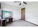 Spacious bedroom with a ceiling fan and a flat screen television on a media console at 6712 Kittery Dr, Las Vegas, NV 89107