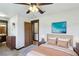 Bright bedroom with a ceiling fan and access to the bathroom at 6712 Kittery Dr, Las Vegas, NV 89107