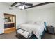 Comfortable bedroom with a ceiling fan and bathroom access at 6712 Kittery Dr, Las Vegas, NV 89107