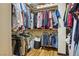 Spacious walk-in closet with ample storage space and hardwood floors at 6712 Kittery Dr, Las Vegas, NV 89107