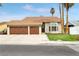 Inviting single-Gathering home with a well-manicured lawn and a three-car garage at 6712 Kittery Dr, Las Vegas, NV 89107