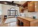 Cozy living room features a built-in desk and a large window with neighborhood views at 6712 Kittery Dr, Las Vegas, NV 89107