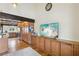 Open concept living room featuring custom cabinets and trim and hardwood flooring at 6712 Kittery Dr, Las Vegas, NV 89107