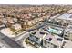 Panoramic aerial view of new townhomes with solar panels near community pool at 6821 Prairie Pearl St, Las Vegas, NV 89148