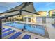 Sparkling community pool and lounge area offers residents a perfect space for relaxation and recreation at 6821 Prairie Pearl St, Las Vegas, NV 89148