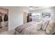 Sunny main bedroom with view to the outside and a well-appointed walk-in closet at 6821 Prairie Pearl St, Las Vegas, NV 89148