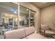 Inviting patio area with comfortable seating and views of the open-concept living space at 6821 Prairie Pearl St, Las Vegas, NV 89148