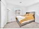 Cozy bedroom with a window view of a neighboring house at 7017 Magenta Moon St, North Las Vegas, NV 89086