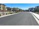 Inviting community entrance with manicured landscaping and secure gated access for residents at 7017 Magenta Moon St, North Las Vegas, NV 89086