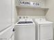 Laundry room featuring a washer and dryer, and decor at 7017 Magenta Moon St, North Las Vegas, NV 89086