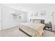 Serene bedroom with plush carpet, a large window, and neutral decor creating a relaxing retreat at 7017 Magenta Moon St, North Las Vegas, NV 89086