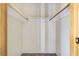 A empty walk-in closet featuring carpeted floors and wood trim at 7054 Burcot Ave # G40, Las Vegas, NV 89156