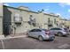 Side view of the building with balconies and permit parking at 7054 Burcot Ave # G40, Las Vegas, NV 89156