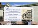 Sunrise Mountain Townhomes signage indicates a professionally managed, private residential community with parking guidelines at 7054 Burcot Ave # G40, Las Vegas, NV 89156