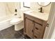 Modern bathroom with a stylish vanity, a sleek black faucet, and a marble-tiled shower, perfect for relaxation at 8101 Spur Ct, Las Vegas, NV 89145