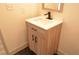 Bathroom featuring a modern vanity with quartz countertop and contemporary fixtures at 8101 Spur Ct, Las Vegas, NV 89145