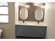 Bathroom featuring double vanity with marble countertop, modern mirrors, and updated cabinets at 8101 Spur Ct, Las Vegas, NV 89145