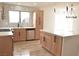 Bright open kitchen with stainless steel appliances, quartz countertops, and modern fixtures at 8101 Spur Ct, Las Vegas, NV 89145