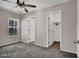 Spacious bedroom with modern ceiling fan, neutral walls, and ample natural light shining through the window at 9050 W Tropicana Ave # 1009, Las Vegas, NV 89147