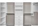 Bright walk-in closet with organizers offers plenty of storage at 9050 W Tropicana Ave # 1009, Las Vegas, NV 89147