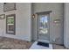 Welcoming front entrance with a stylish modern door, updated paint and clear house number at 9050 W Tropicana Ave # 1009, Las Vegas, NV 89147